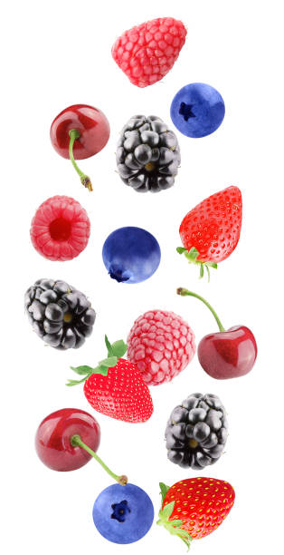 istock Falling blackberry, cherry, strawberry, raspberry and blueberry fruits isolated on white background with clipping path as package design element and advertising 986667348