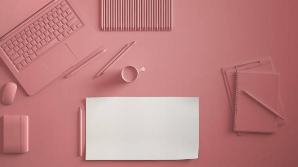 istock Pastel pink monochrome minimal office table desk. Workspace with laptop, notebook, pencils and coffee cup. Flat lay, top view, blank paper mockup template 986673608