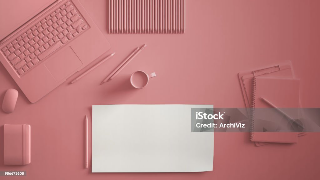 Pastel pink monochrome minimal office table desk. Workspace with laptop, notebook, pencils and coffee cup. Flat lay, top view, blank paper mockup template Monochrome Stock Photo