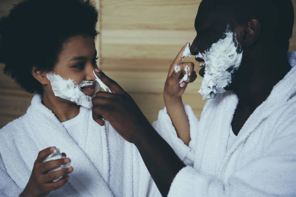 istock Close up. Afro American father and little son 986679006