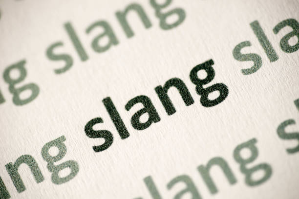 istock word slang printed on paper macro 986687180