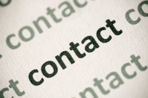 istock word contact printed on paper macro 986687614