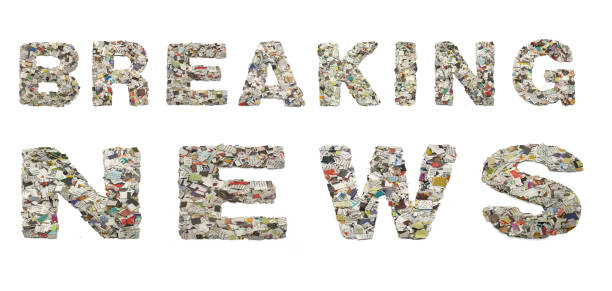 istock the words BREAKING NEWS with newspaper confetti 986706442
