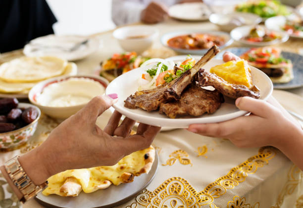 istock Muslim family having a Ramadan feast 986707952