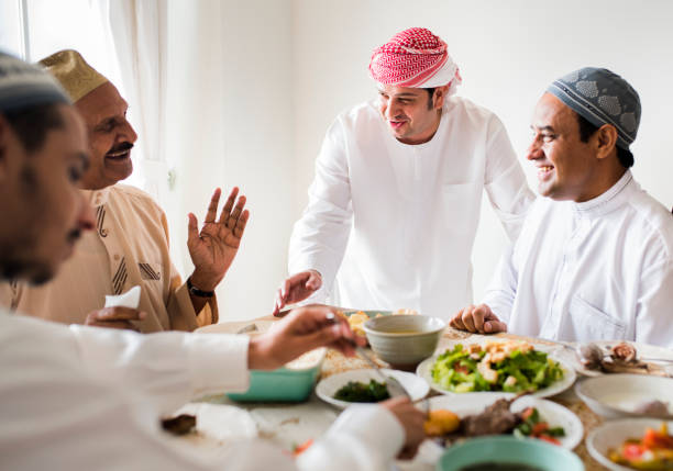 istock Muslim family having a Ramadan feast 986712012