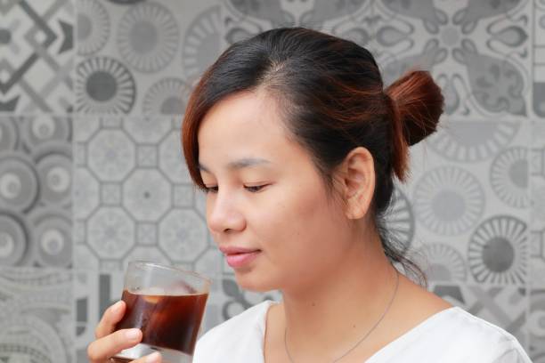 istock a woman thinking about dinner menu in the kitchen 986715858