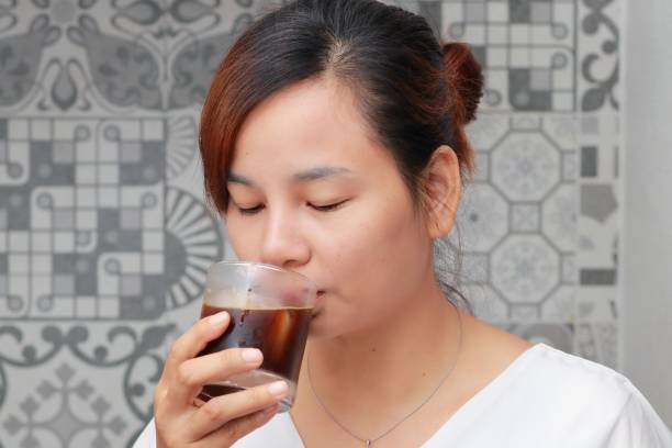 istock a woman thinking about dinner menu in the kitchen 986715860