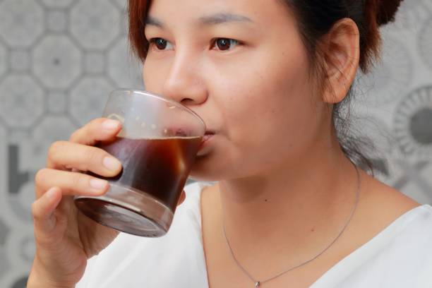 istock a woman thinking about dinner menu in the kitchen 986715898