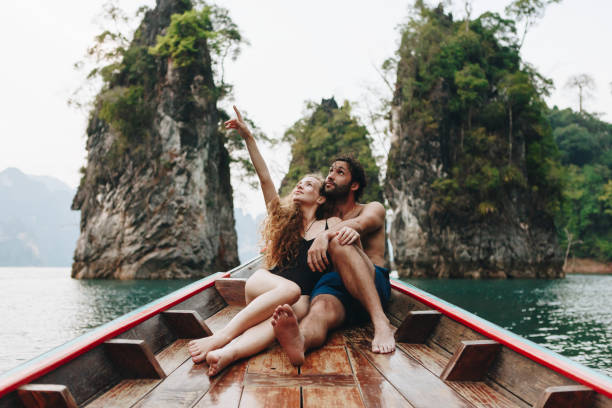 istock Couple boating on a quiet lake 986717426