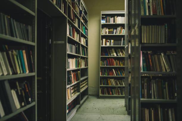 istock Library aisle with bookshelves 986722662