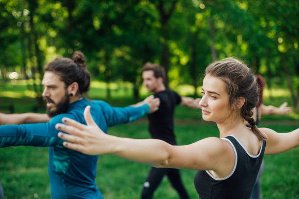 istock Fit people stretching outdoors 986726530