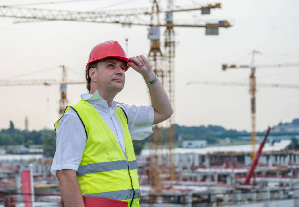 Proud and satisfied construction site engineer. stock photo