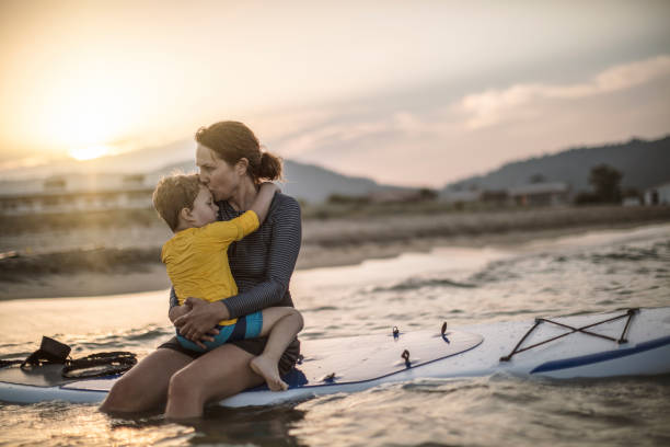 istock Mother and son on a paddle board 986740602