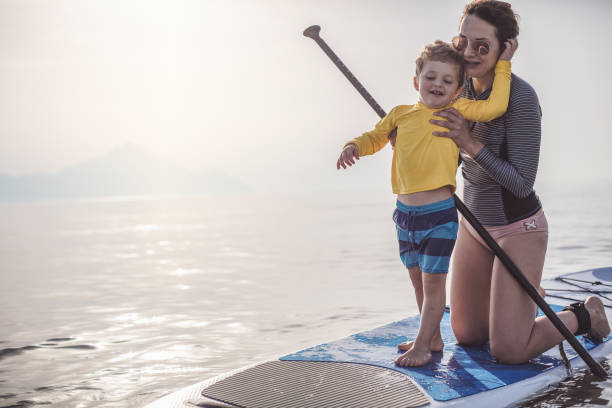 istock Surfing Lessons for my little one 986740822