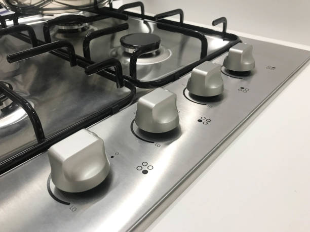 istock Side view of gas modern stove 986741816