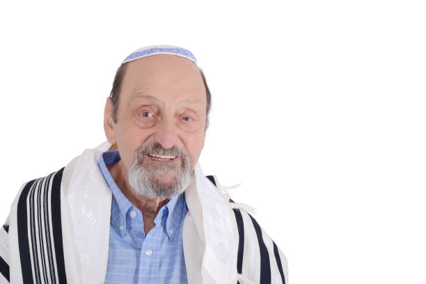 Frontal view of a Jew praying to his god and curving his face with a siddur.