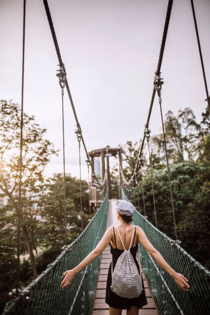 istock Traveler Girl Sightseeing Rain Forest In Malaysia 986754276