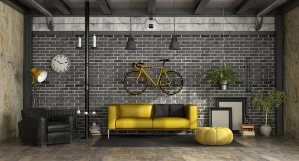 istock Black and yellow living room in a loft 986793222