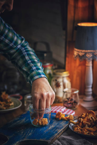 istock Preserving Organic Mushrooms in Jars 986797938