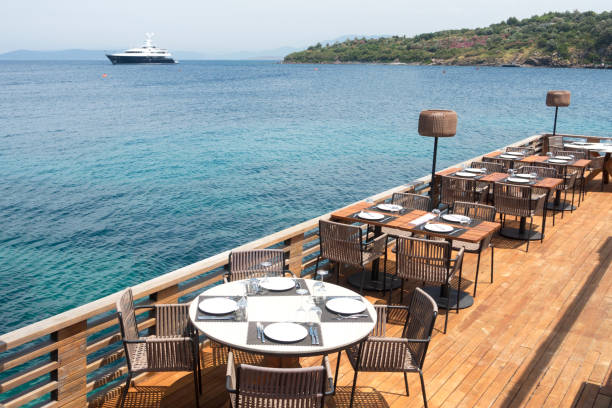 istock Romantic Dinner tables near the sea. 986799326