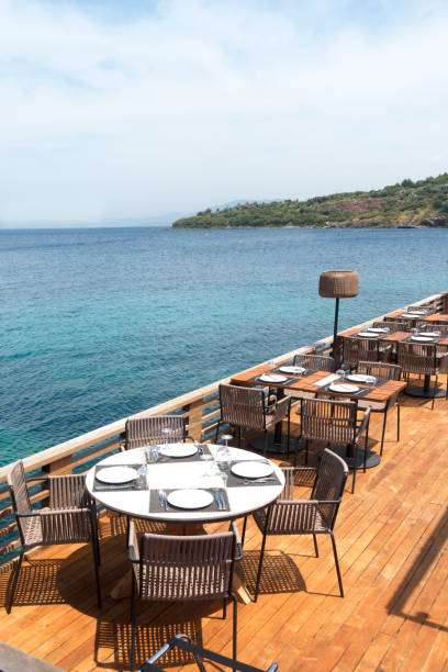 istock Romantic Dinner tables near the sea. 986799820