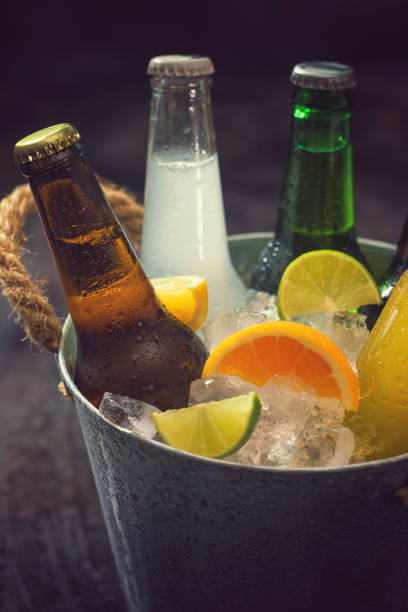 istock Cold Bottles of Various Drinks in The Ice Bucket 986822200