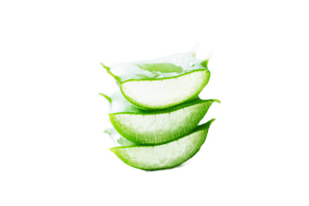 istock stacked sliced aloe vera gel leaf on white background. 986822822