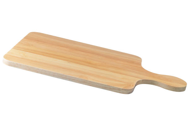 istock Wood chopping board isolated on white background 986823496