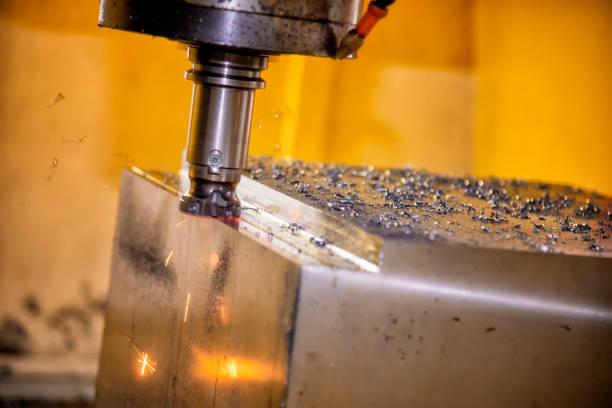 istock The CNC milling machine cutting the mold part in roughing  process 986823562