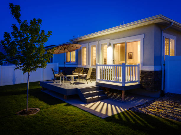 istock Suburb House Backyard Patio at Dusk 986832112