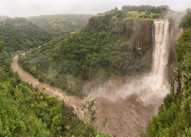 The flooded Umgeni River plunges 95 m down the Howick Falls, in Howick, in the Kwazulu-Natal Midlands Meander