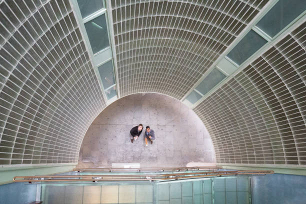 istock Different perspective of glass building from below 986852542