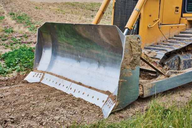 grading bucket of a bulldozer stock photo