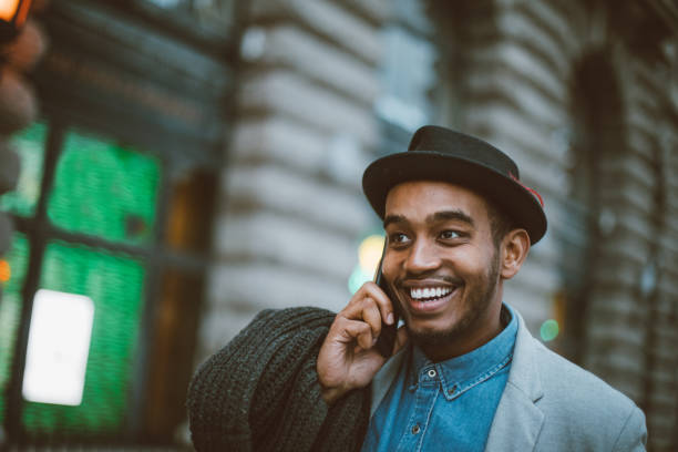 istock Charming man on the phone 986857808