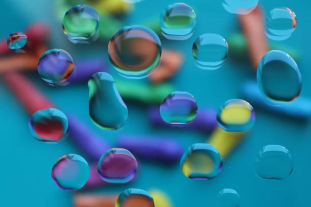 istock Water and oil drop photography creating colours 986858550