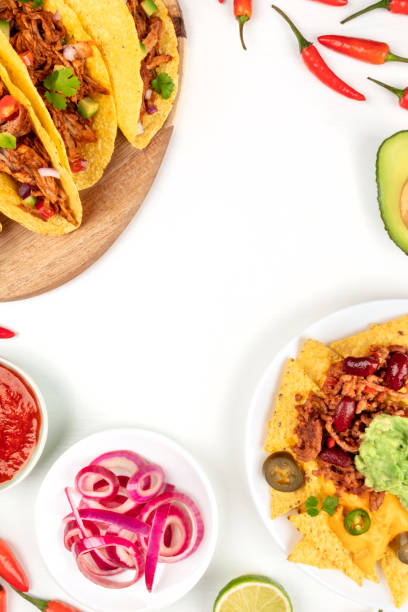 istock Overhead photo of typical Mexican dishes on white with copy space 986862888