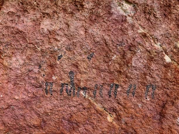 istock Ancient rock painting on sandstone, cederberg mountains 986870328