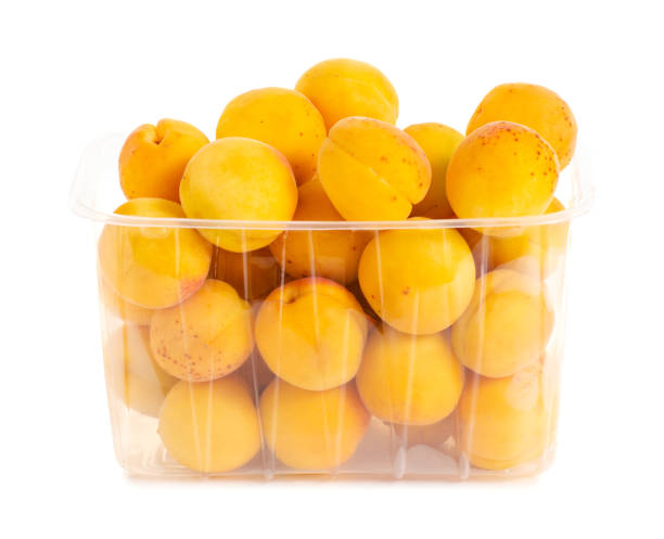 istock Apricots in a basket orange fruit 986870952