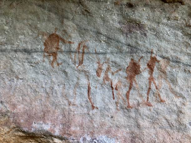 istock Ancient rock painting on sandstone, cederberg mountains 986871050
