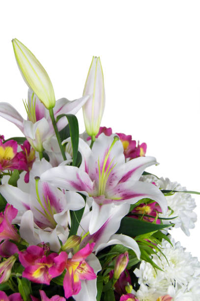 istock bouquet of lilies, alstromeries and chrysanthemums on light background 986879094