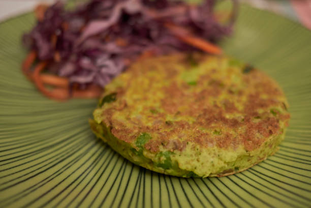 istock Vegetarian burger and salad 986883326