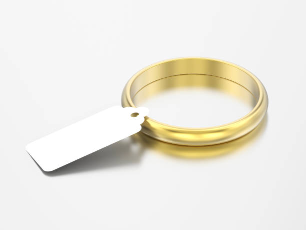 istock 3D illustration yellow gold classic engagement wedding ring with tag 986891094