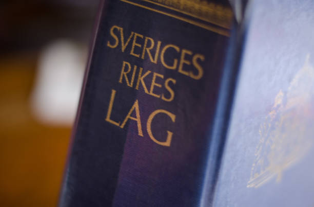 Swedish lawbook Stockholm, Sweden - 12 June 2018. The collected laws of Sweden in a blue book in close-up. elasmobranch stock pictures, royalty-free photos & images