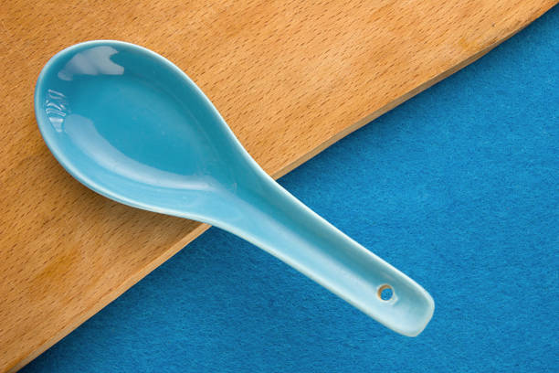 Walnuts. Top view of wooden Board and blue background. For kitchen and menu