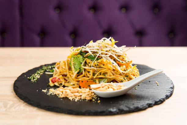 istock Pad Thai with  chicken and rice noodles 986959748