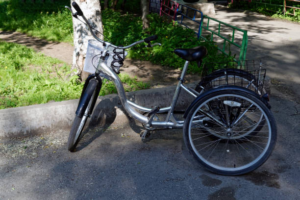 istock metallic and black adult tricycle. 987025104