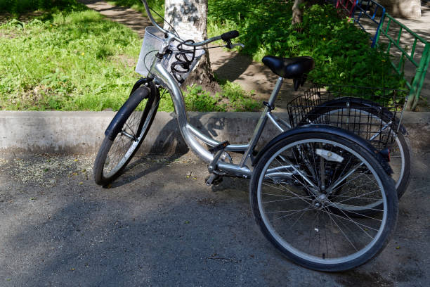 istock metallic and black adult tricycle. 987025120