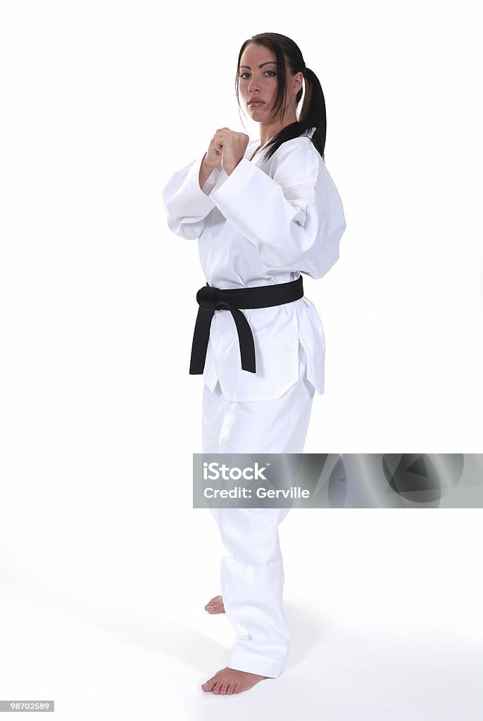 After the bow in Martial artist in a fighting stance. Adult Stock Photo