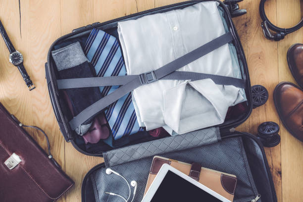 istock The luggage full of cloths 987034540