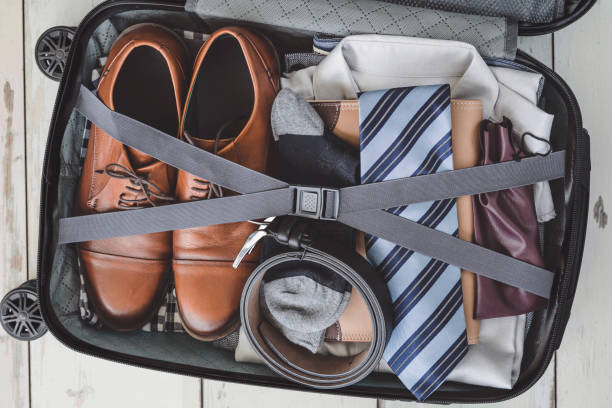 istock The luggage full of cloths 987036662